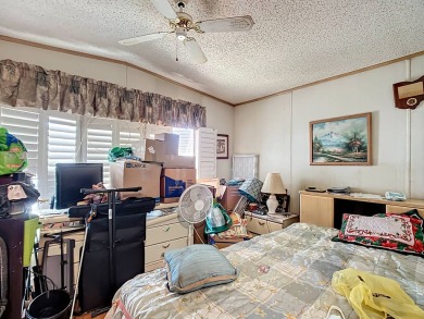 (Ver Espanol Abajo)  Lot rent $587 includes use of park on Lake Henry Golf Club in Florida - for sale on GolfHomes.com, golf home, golf lot
