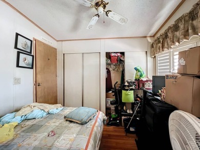 (Ver Espanol Abajo)  Lot rent $587 includes use of park on Lake Henry Golf Club in Florida - for sale on GolfHomes.com, golf home, golf lot