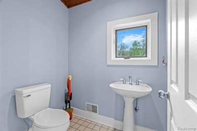 Welcome to this stunning Cape Cod home that offers a perfect mix on Blackheath Golf Club in Michigan - for sale on GolfHomes.com, golf home, golf lot
