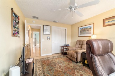 Welcome to this beautifully updated Banyan/Bougainvillea model on The Links of Spruce Creek in Florida - for sale on GolfHomes.com, golf home, golf lot