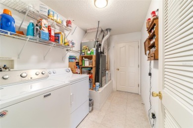Welcome to this beautifully updated Banyan/Bougainvillea model on The Links of Spruce Creek in Florida - for sale on GolfHomes.com, golf home, golf lot