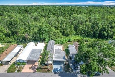 (Ver Espanol Abajo)  Lot rent $587 includes use of park on Lake Henry Golf Club in Florida - for sale on GolfHomes.com, golf home, golf lot