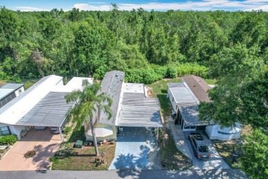 (Ver Espanol Abajo)  Lot rent $587 includes use of park on Lake Henry Golf Club in Florida - for sale on GolfHomes.com, golf home, golf lot