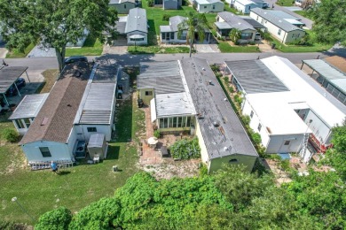 (Ver Espanol Abajo)  Lot rent $587 includes use of park on Lake Henry Golf Club in Florida - for sale on GolfHomes.com, golf home, golf lot