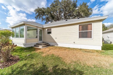 Welcome to this beautifully updated Banyan/Bougainvillea model on The Links of Spruce Creek in Florida - for sale on GolfHomes.com, golf home, golf lot