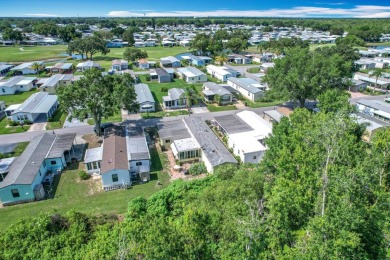 (Ver Espanol Abajo)  Lot rent $587 includes use of park on Lake Henry Golf Club in Florida - for sale on GolfHomes.com, golf home, golf lot