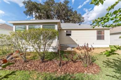 Welcome to this beautifully updated Banyan/Bougainvillea model on The Links of Spruce Creek in Florida - for sale on GolfHomes.com, golf home, golf lot