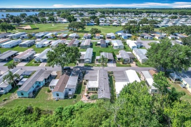 (Ver Espanol Abajo)  Lot rent $587 includes use of park on Lake Henry Golf Club in Florida - for sale on GolfHomes.com, golf home, golf lot