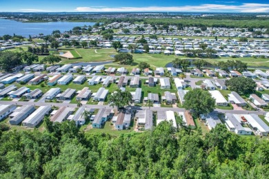 (Ver Espanol Abajo)  Lot rent $587 includes use of park on Lake Henry Golf Club in Florida - for sale on GolfHomes.com, golf home, golf lot