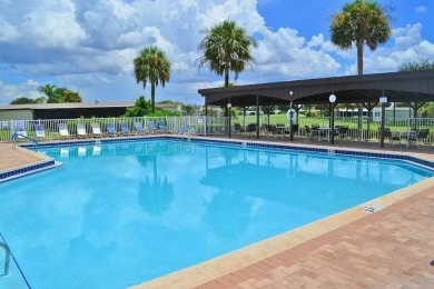 (Ver Espanol Abajo)  Lot rent $587 includes use of park on Lake Henry Golf Club in Florida - for sale on GolfHomes.com, golf home, golf lot
