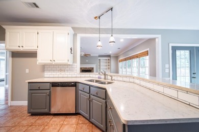 Welcome to 4880 Turnberry Lane - a classic Southern home with on Maple Ridge Golf Club in Georgia - for sale on GolfHomes.com, golf home, golf lot