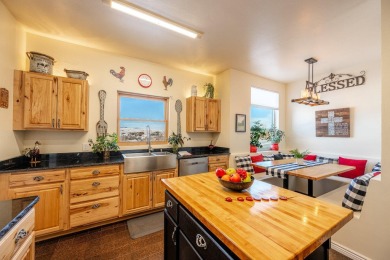 This stunning 4-Bedroom, 2.5 Bath home w/over 2,500 sq ft of on The Powder Horn Golf Club - Mountain in Wyoming - for sale on GolfHomes.com, golf home, golf lot