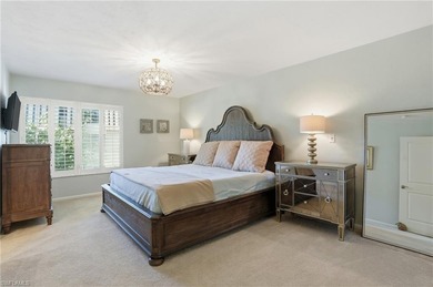 Tucked within the lush, coastal community of the Sanctuary at on Club at Pelican Bay Golf Course in Florida - for sale on GolfHomes.com, golf home, golf lot