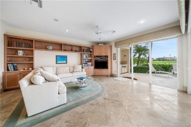 This elegant villa pool home offers 3,222 sf under air & 4,415 on Sailfish Point Golf Club, Inc. in Florida - for sale on GolfHomes.com, golf home, golf lot