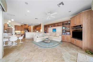 This elegant villa pool home offers 3,222 sf under air & 4,415 on Sailfish Point Golf Club, Inc. in Florida - for sale on GolfHomes.com, golf home, golf lot