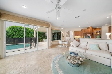 This elegant villa pool home offers 3,222 sf under air & 4,415 on Sailfish Point Golf Club, Inc. in Florida - for sale on GolfHomes.com, golf home, golf lot