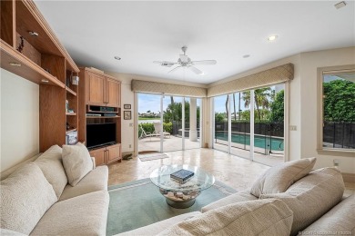 This elegant villa pool home offers 3,222 sf under air & 4,415 on Sailfish Point Golf Club, Inc. in Florida - for sale on GolfHomes.com, golf home, golf lot
