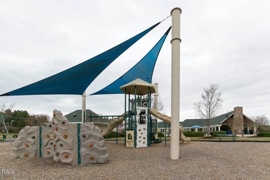 Discover elegance and comfort in this stunning new construction on Chapel Ridge Golf Club in North Carolina - for sale on GolfHomes.com, golf home, golf lot