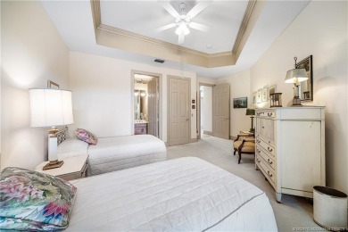 This elegant villa pool home offers 3,222 sf under air & 4,415 on Sailfish Point Golf Club, Inc. in Florida - for sale on GolfHomes.com, golf home, golf lot