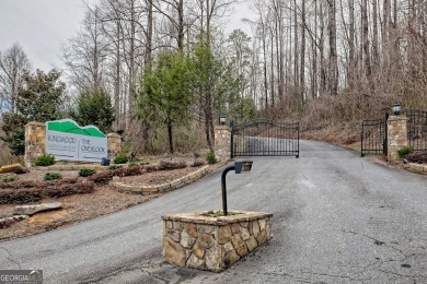 From the moment you step through the front door of this charming on Kingwood Golf Club and Resort in Georgia - for sale on GolfHomes.com, golf home, golf lot