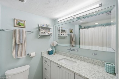 Tucked within the lush, coastal community of the Sanctuary at on Club at Pelican Bay Golf Course in Florida - for sale on GolfHomes.com, golf home, golf lot