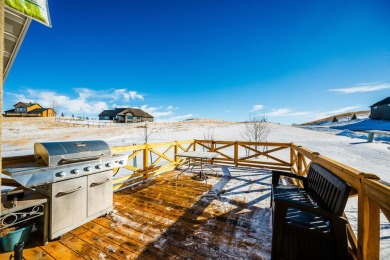 This stunning 4-Bedroom, 2.5 Bath home w/over 2,500 sq ft of on The Powder Horn Golf Club - Mountain in Wyoming - for sale on GolfHomes.com, golf home, golf lot