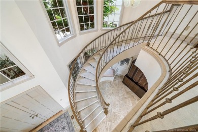 This elegant villa pool home offers 3,222 sf under air & 4,415 on Sailfish Point Golf Club, Inc. in Florida - for sale on GolfHomes.com, golf home, golf lot