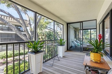 Tucked within the lush, coastal community of the Sanctuary at on Club at Pelican Bay Golf Course in Florida - for sale on GolfHomes.com, golf home, golf lot