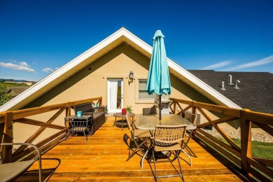 This stunning 4-Bedroom, 2.5 Bath home w/over 2,500 sq ft of on The Powder Horn Golf Club - Mountain in Wyoming - for sale on GolfHomes.com, golf home, golf lot