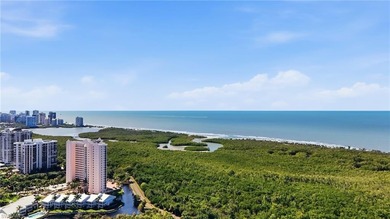 Tucked within the lush, coastal community of the Sanctuary at on Club at Pelican Bay Golf Course in Florida - for sale on GolfHomes.com, golf home, golf lot