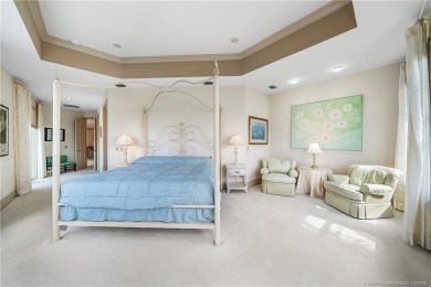 This elegant villa pool home offers 3,222 sf under air & 4,415 on Sailfish Point Golf Club, Inc. in Florida - for sale on GolfHomes.com, golf home, golf lot