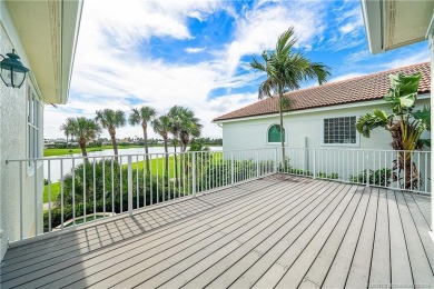 This elegant villa pool home offers 3,222 sf under air & 4,415 on Sailfish Point Golf Club, Inc. in Florida - for sale on GolfHomes.com, golf home, golf lot
