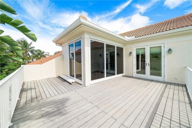This elegant villa pool home offers 3,222 sf under air & 4,415 on Sailfish Point Golf Club, Inc. in Florida - for sale on GolfHomes.com, golf home, golf lot
