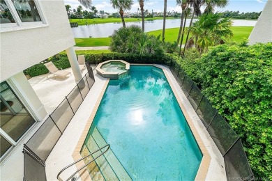 This elegant villa pool home offers 3,222 sf under air & 4,415 on Sailfish Point Golf Club, Inc. in Florida - for sale on GolfHomes.com, golf home, golf lot