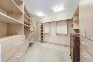 This elegant villa pool home offers 3,222 sf under air & 4,415 on Sailfish Point Golf Club, Inc. in Florida - for sale on GolfHomes.com, golf home, golf lot