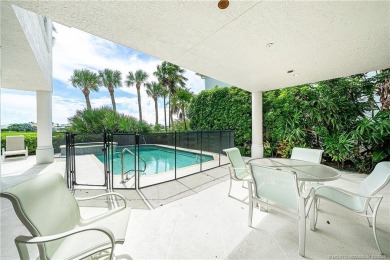 This elegant villa pool home offers 3,222 sf under air & 4,415 on Sailfish Point Golf Club, Inc. in Florida - for sale on GolfHomes.com, golf home, golf lot