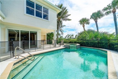 This elegant villa pool home offers 3,222 sf under air & 4,415 on Sailfish Point Golf Club, Inc. in Florida - for sale on GolfHomes.com, golf home, golf lot