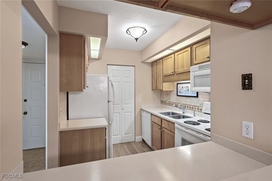 The Exceptional Care And Pride Of Ownership Shows Throughout on Golfview Golf and Racquet Club in Florida - for sale on GolfHomes.com, golf home, golf lot