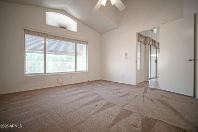 Lovely 2 bed, 2 bath home with a den nestled in the highly on Coyote Lakes Golf Club in Arizona - for sale on GolfHomes.com, golf home, golf lot
