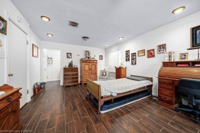 Welcome to your private retreat! This charming 3-bedroom on Ben Geren Regional Park Golf Courses in Arkansas - for sale on GolfHomes.com, golf home, golf lot