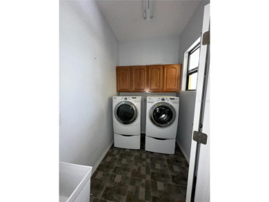 Home needs cosmetic updates and repair !! PRICE REFLECTS CURRENT on Wedgefield Golf Club in Florida - for sale on GolfHomes.com, golf home, golf lot