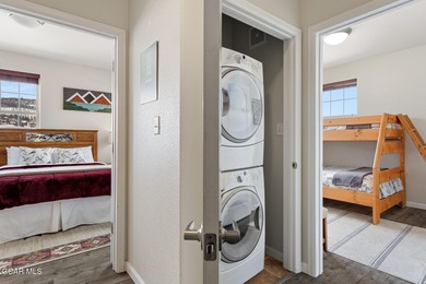 Desirable top floor mountain getaway in Aspen Meadows with full on Headwaters Golf Course At Granby Ranch in Colorado - for sale on GolfHomes.com, golf home, golf lot