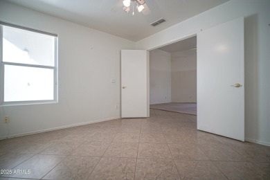 Lovely 2 bed, 2 bath home with a den nestled in the highly on Coyote Lakes Golf Club in Arizona - for sale on GolfHomes.com, golf home, golf lot