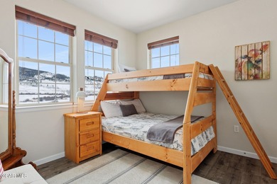 Desirable top floor mountain getaway in Aspen Meadows with full on Headwaters Golf Course At Granby Ranch in Colorado - for sale on GolfHomes.com, golf home, golf lot