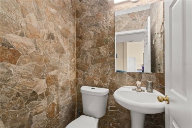 Home needs cosmetic updates and repair !! PRICE REFLECTS CURRENT on Wedgefield Golf Club in Florida - for sale on GolfHomes.com, golf home, golf lot