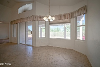 Lovely 2 bed, 2 bath home with a den nestled in the highly on Coyote Lakes Golf Club in Arizona - for sale on GolfHomes.com, golf home, golf lot