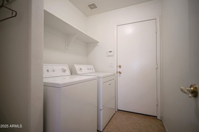 Lovely 2 bed, 2 bath home with a den nestled in the highly on Coyote Lakes Golf Club in Arizona - for sale on GolfHomes.com, golf home, golf lot