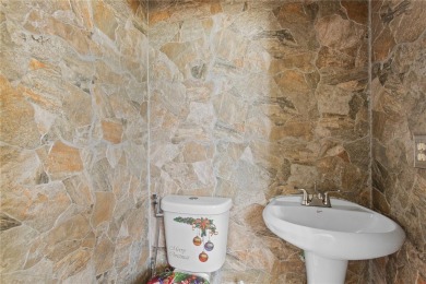 Home needs cosmetic updates and repair !! PRICE REFLECTS CURRENT on Wedgefield Golf Club in Florida - for sale on GolfHomes.com, golf home, golf lot