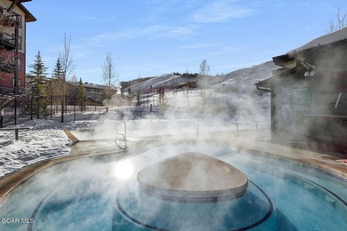 Desirable top floor mountain getaway in Aspen Meadows with full on Headwaters Golf Course At Granby Ranch in Colorado - for sale on GolfHomes.com, golf home, golf lot