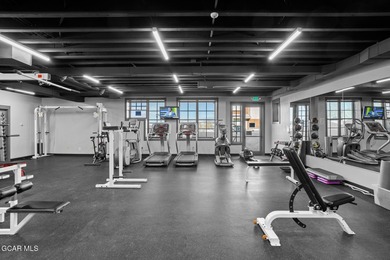 Desirable top floor mountain getaway in Aspen Meadows with full on Headwaters Golf Course At Granby Ranch in Colorado - for sale on GolfHomes.com, golf home, golf lot